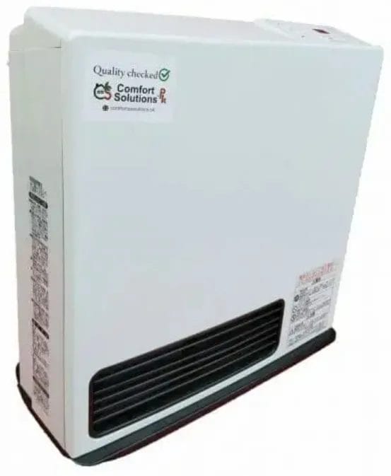 A white comfort solutions space heater with black vent grille and "Quality checked" sticker on top right. A label with text is visible on the left side of the heater.