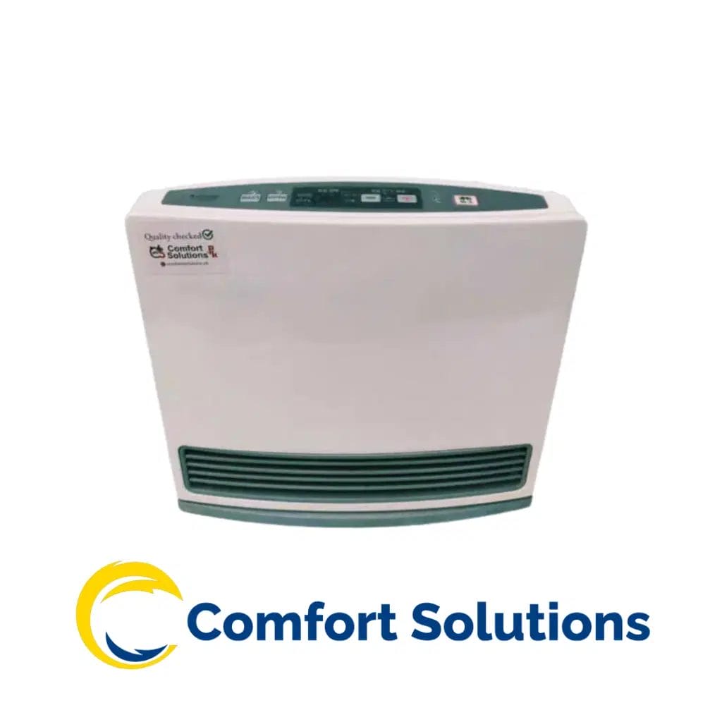 Comfort Solutions space heater with a white body and gray accents. The unit features a control panel on top and a horizontal grill on the front for heat distribution. "Quality checked" is visible on a sticker.